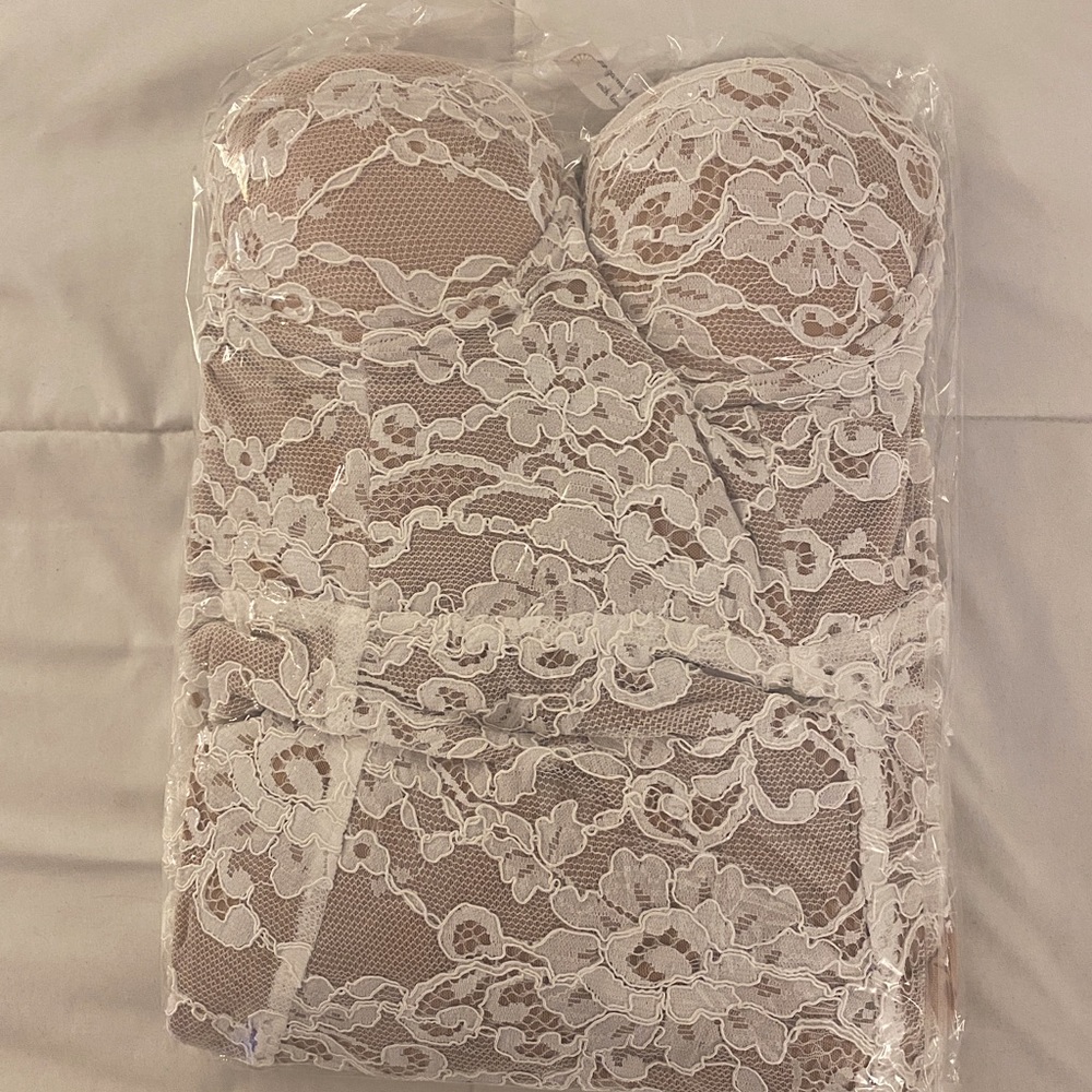 Lace / nude gown with removable sleeves.